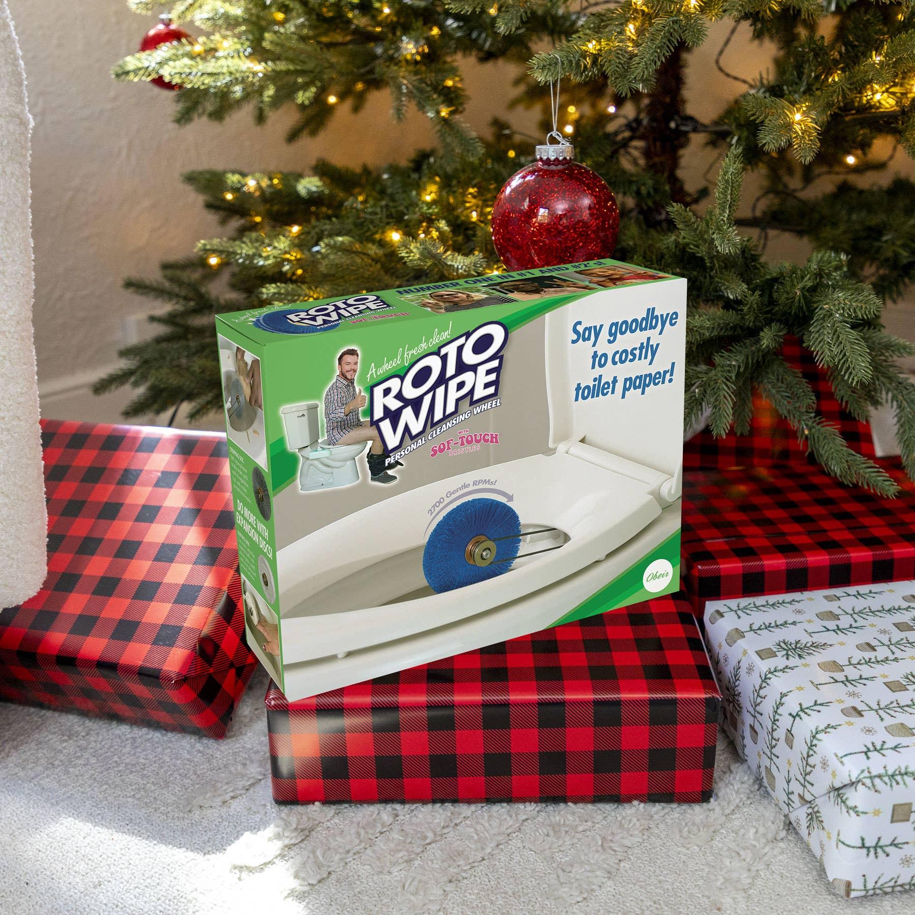 Roto Wipe toilet cleaning device box under Christmas tree with wrapped presents