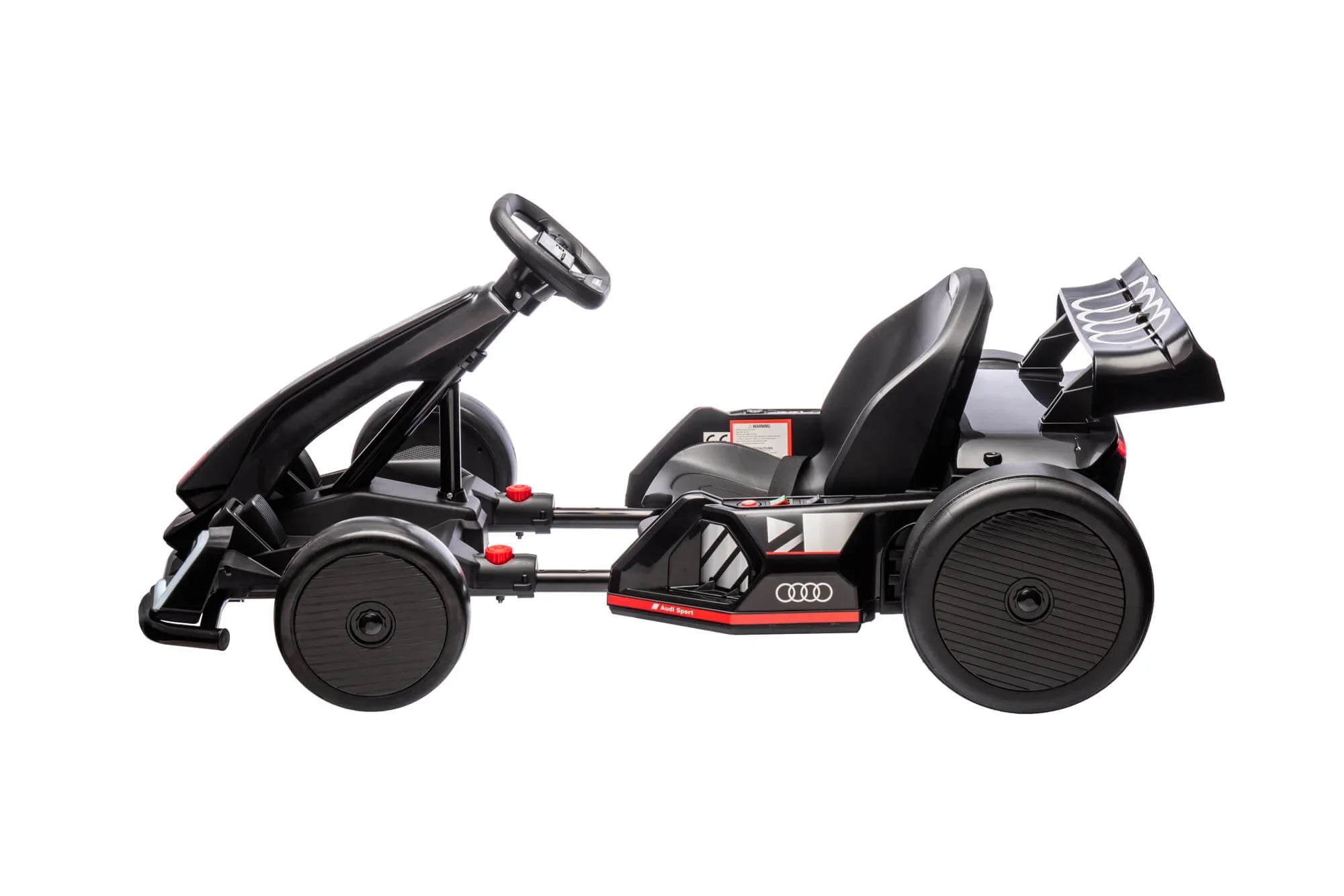 Black Audi Sport kids' pedal go-kart with spoiler and racing design, side view on white
