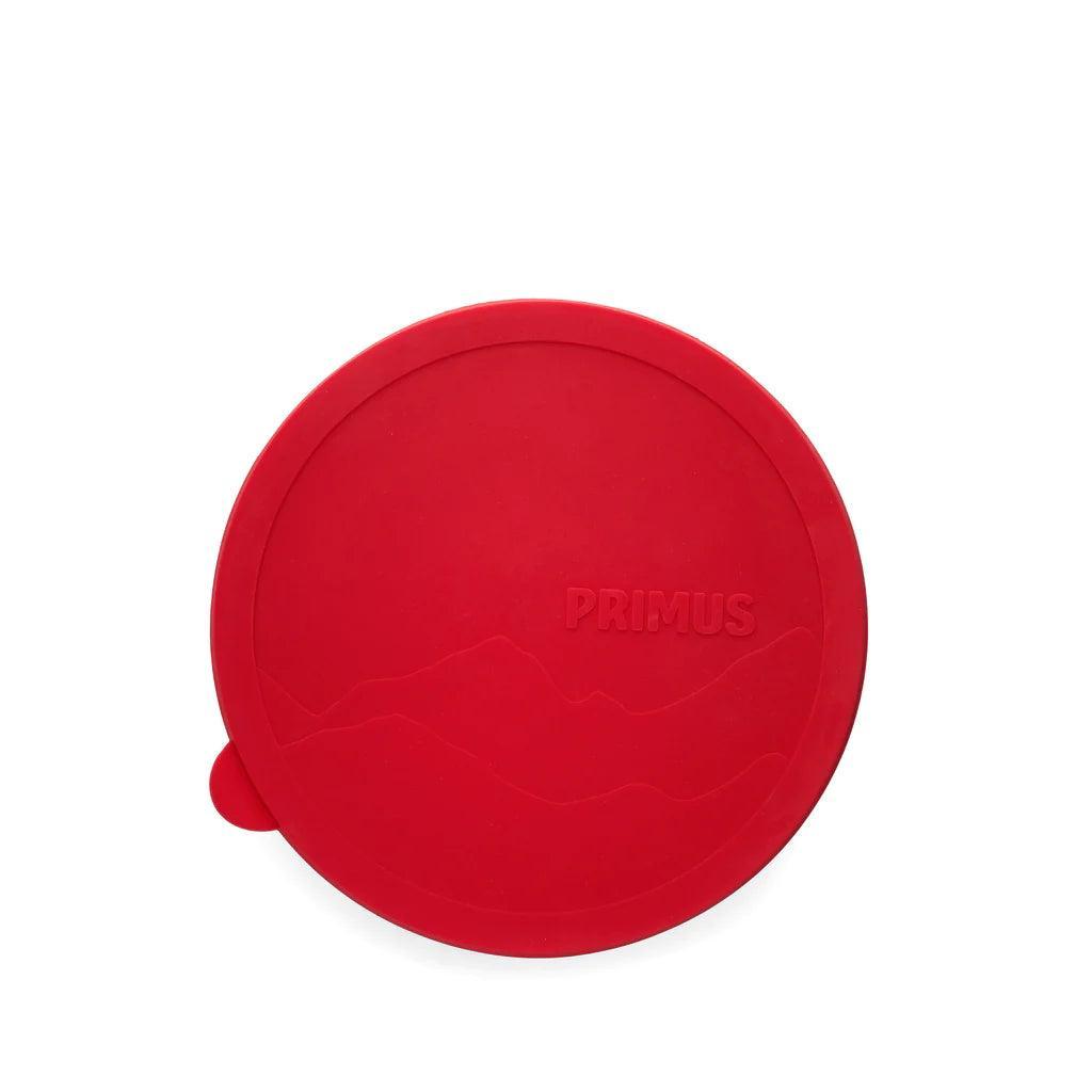 Red Primus campfire bowl lid with embossed mountain design on white background