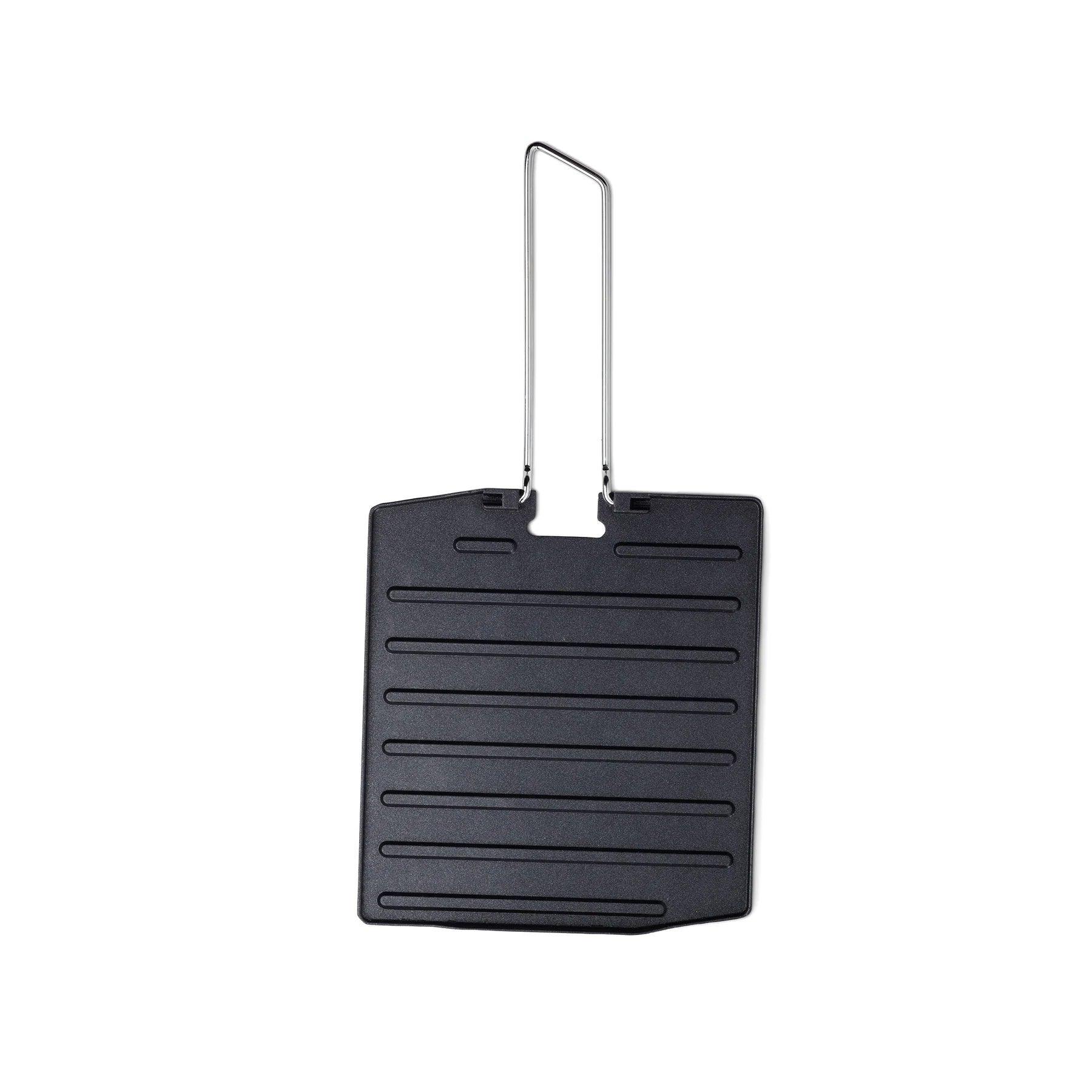 Primus Campfire griddle plate with folding handle on white background