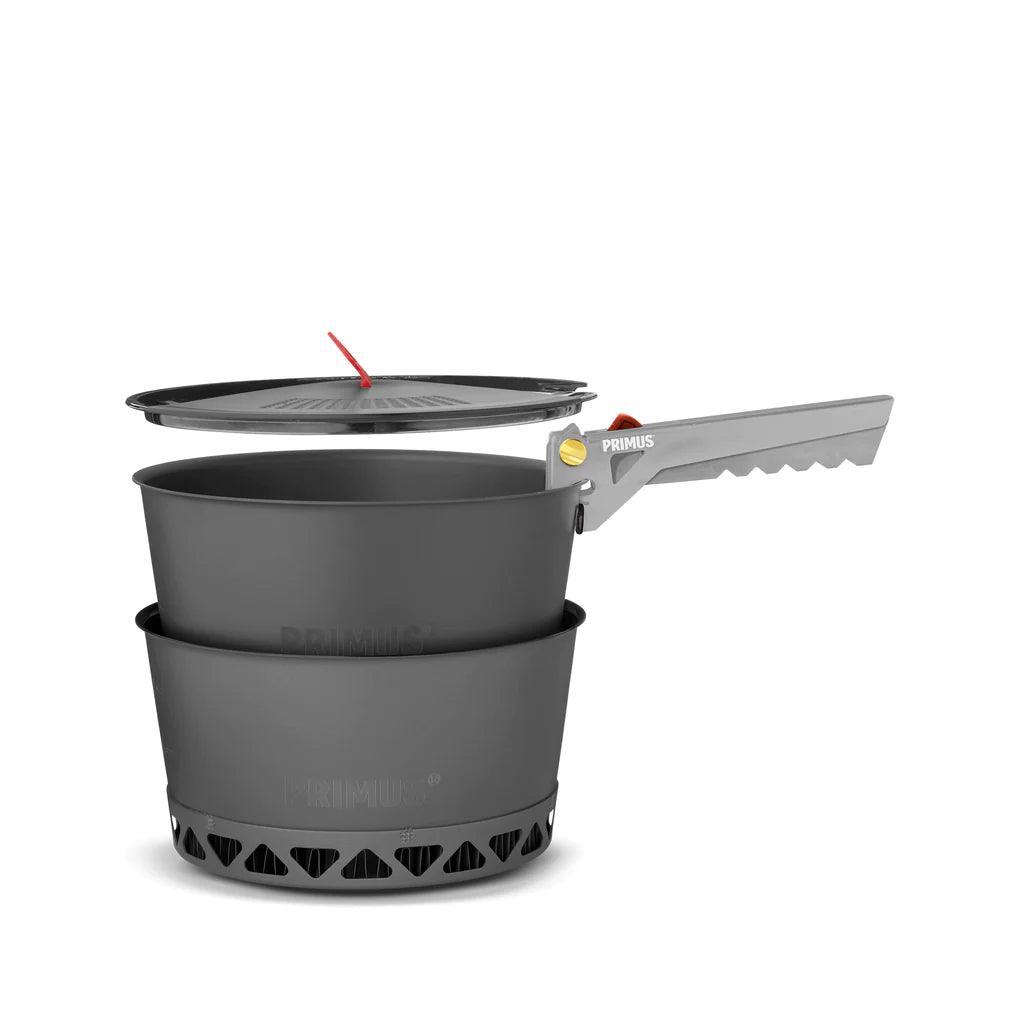 Primus PrimeTech camping pot set with detachable handle and lid on white background