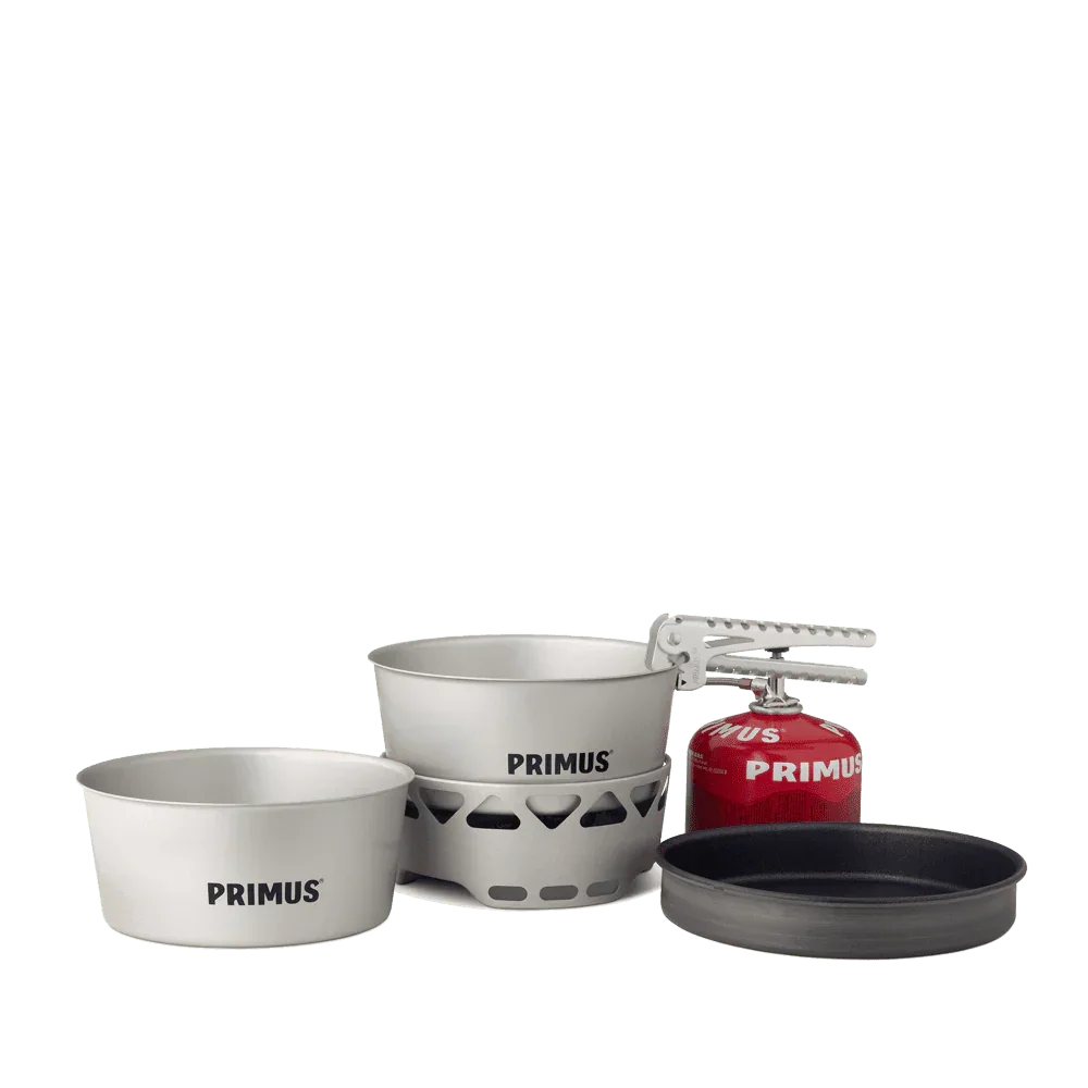 Primus Essential Stove Set with cookware, burner, and red fuel canister