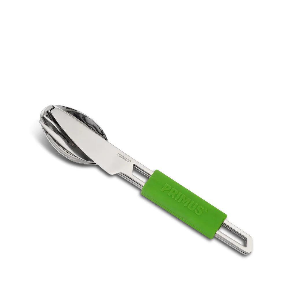 Primus stainless steel camping cutlery set with green handle on white background