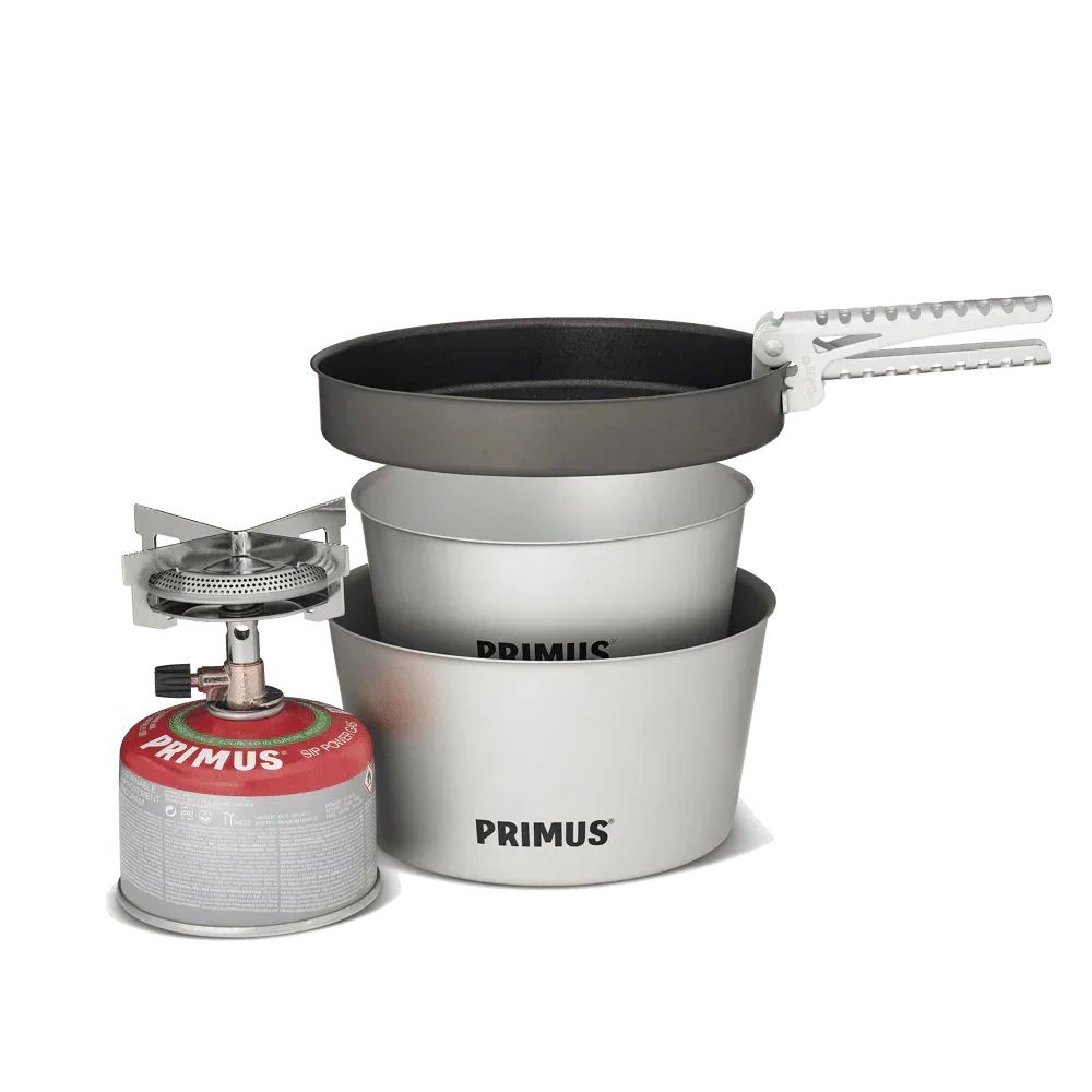 Primus Mimer stove kit with gas canister, silver pots, and black frying pan