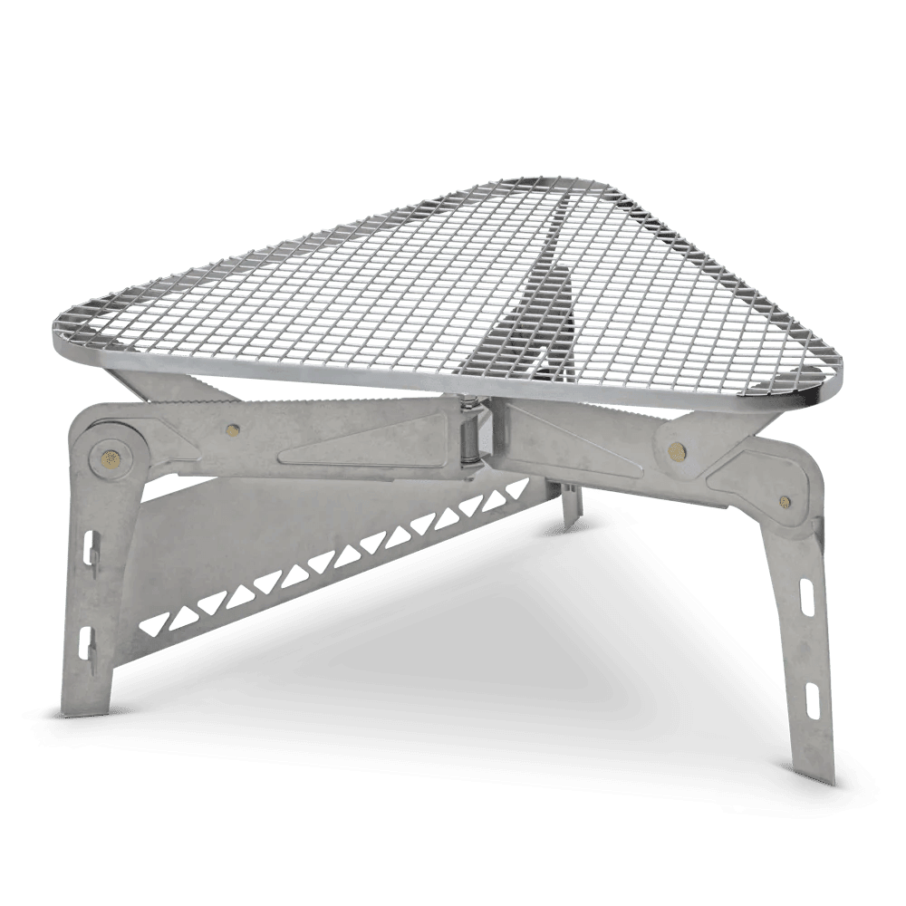 Portable metal camping grill with triangular grate and foldable legs on a plain background