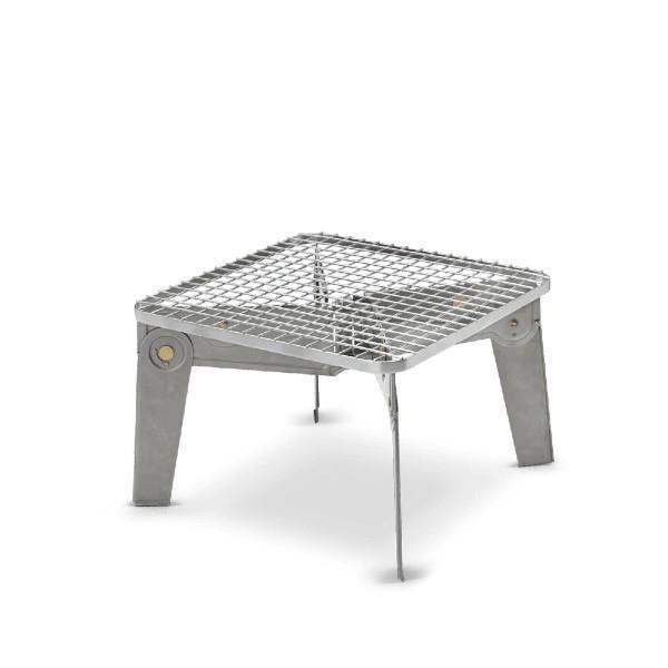 Portable stainless steel folding camp grill with metal grate and four legs