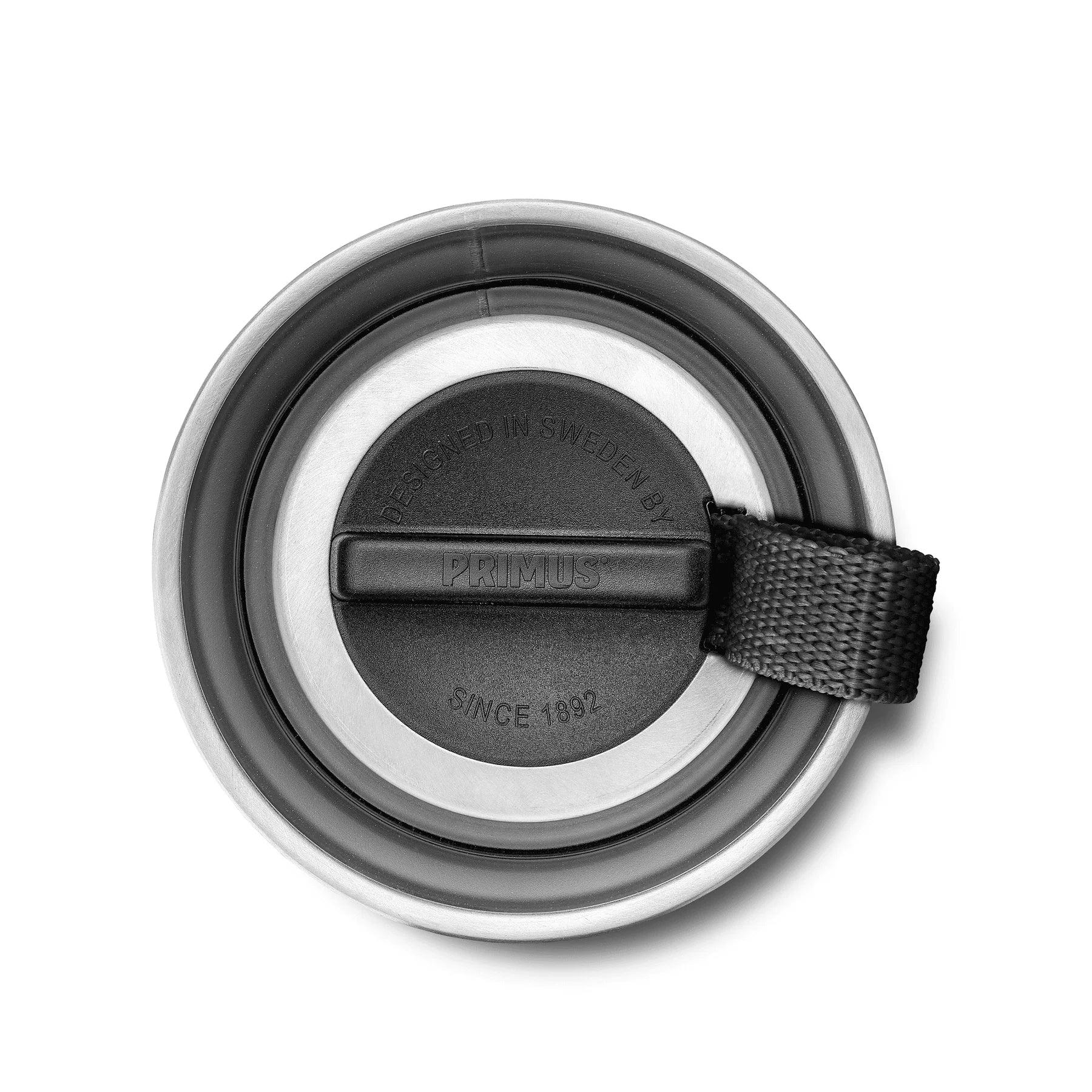 Primus black vacuum mug lid with handle, top view on white background