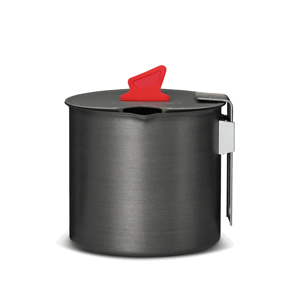 Titanium camping pot with lid, red handle, and foldable metal grip on green background
