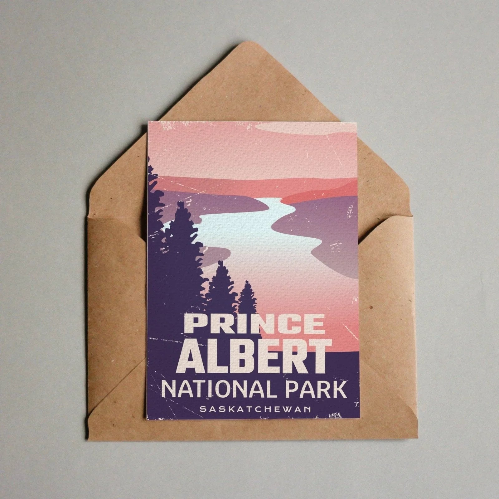 Prince Albert National Park postcard with stylized river, trees, and mountains in envelope