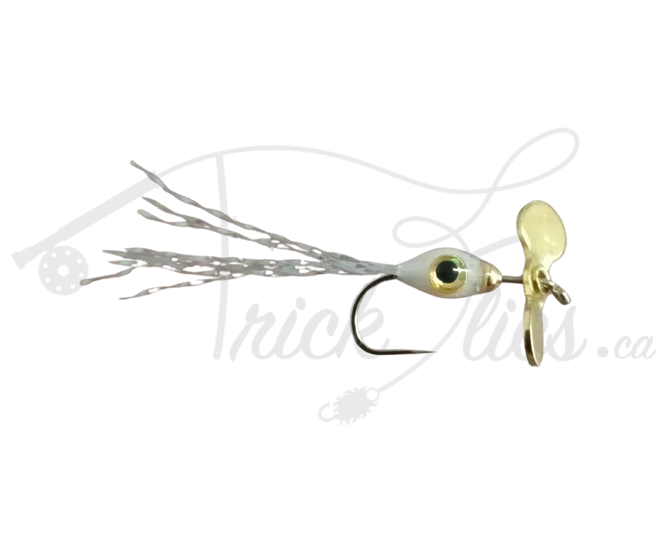 White propeller streamer fishing lure with gold blade and realistic eye design