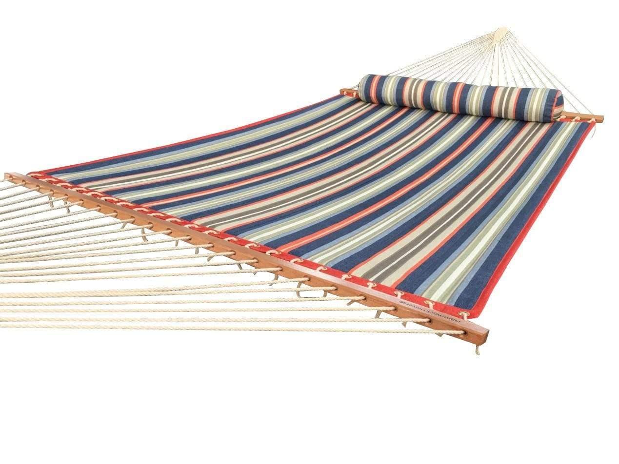 Quilted hammock with red, blue, and green stripes and matching pillow on white background