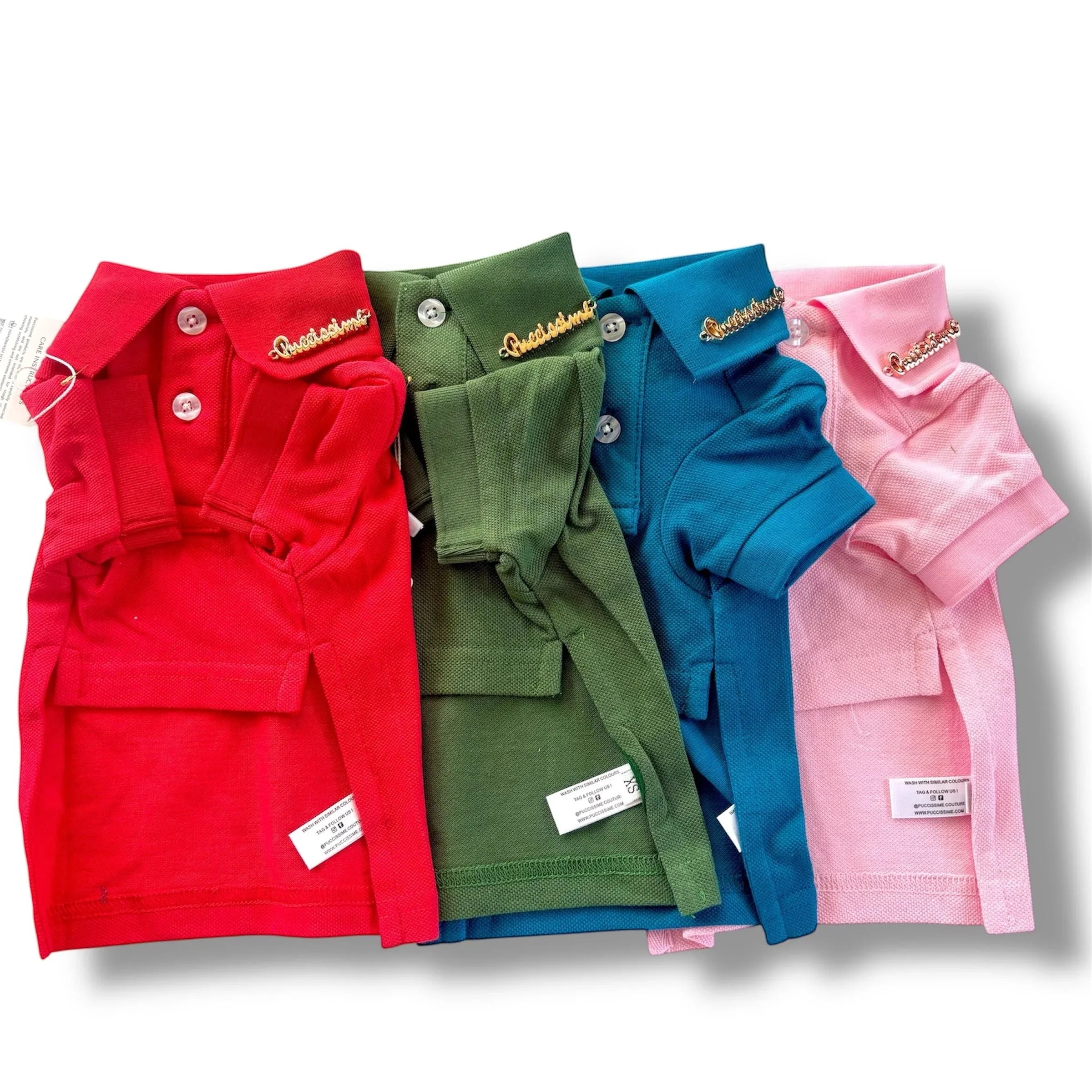 Colorful dog polo shirts in red, green, blue, and pink with embroidered collars
