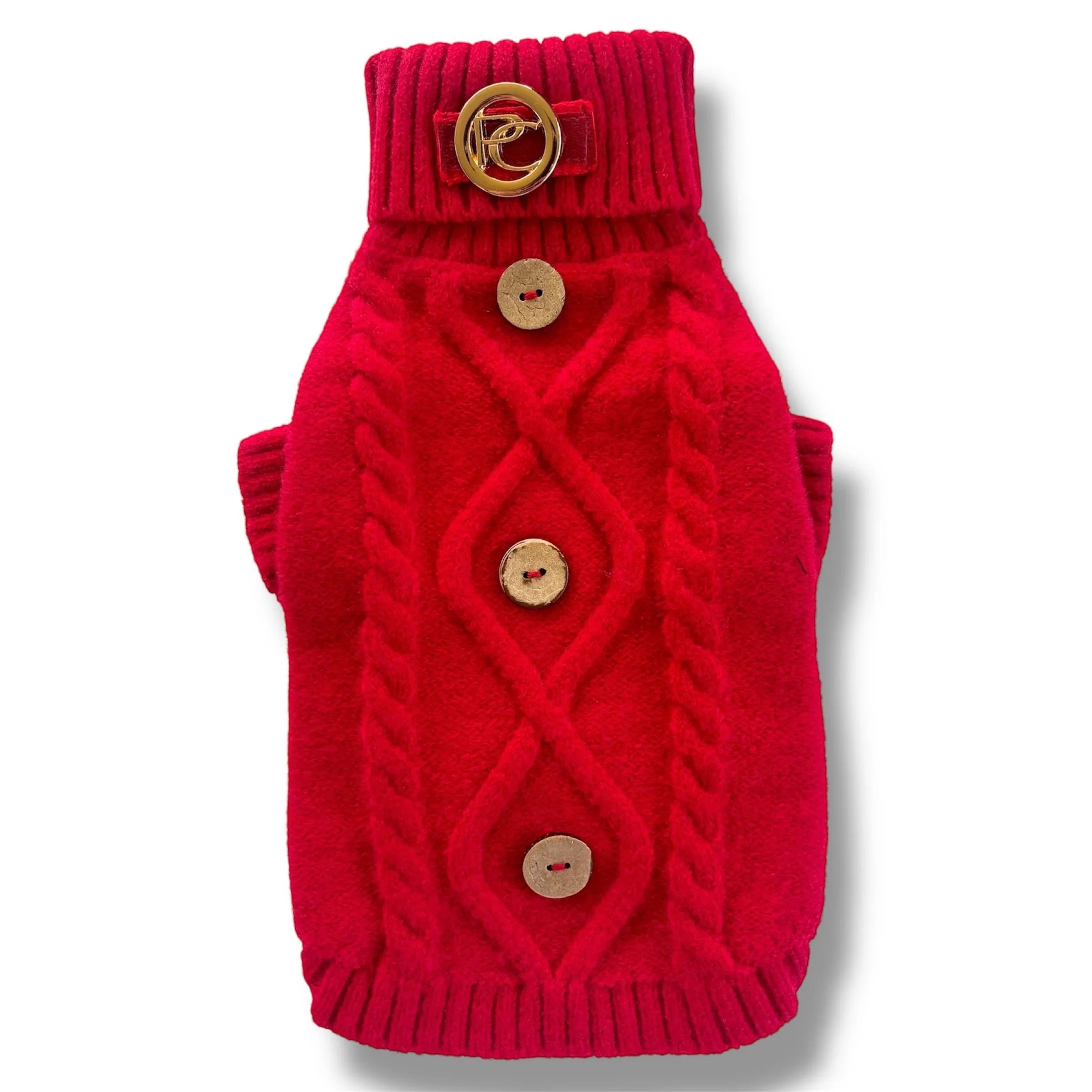 Red cable knit dog sweater with wooden buttons and gold buckle on turtleneck collar