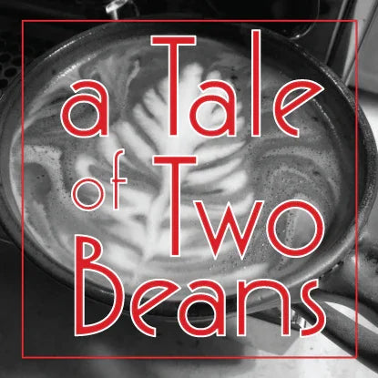 Latte art in a coffee cup with text 'a Tale of Two Beans' overlayed