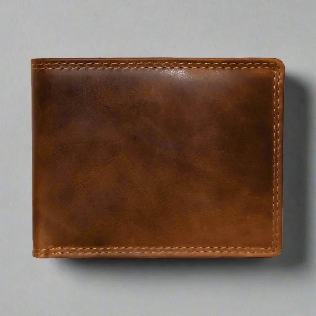 Brown leather men's bifold wallet with visible stitching on a plain background
