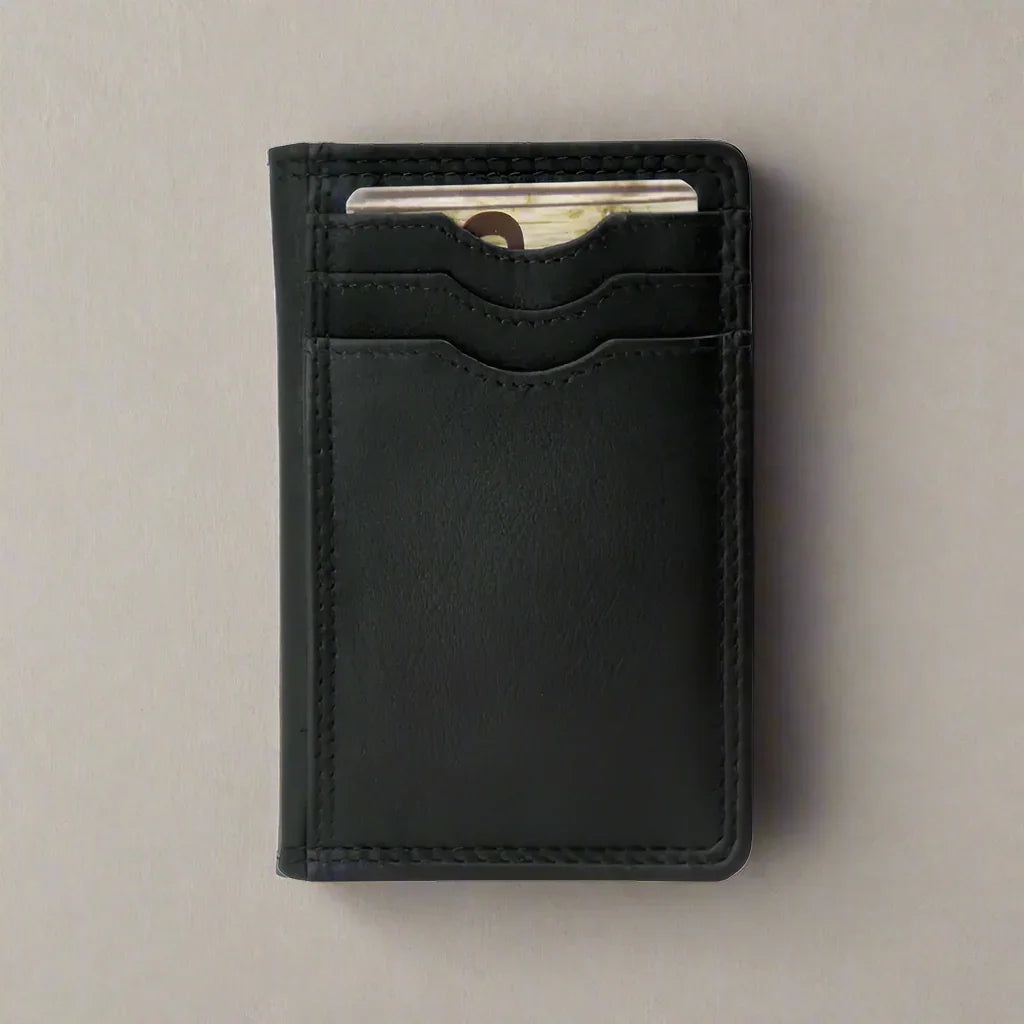 Black leather men’s credit card wallet with card slots on plain background