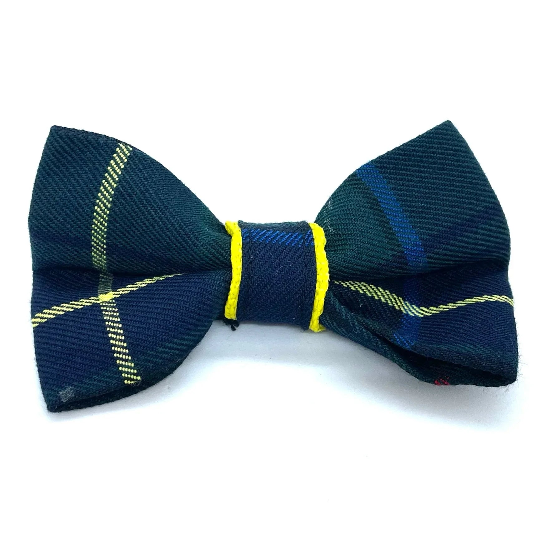 Dark green plaid bow tie with yellow accent band on white background