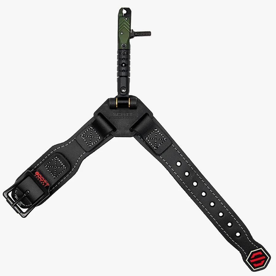 Scott Archery black wrist release with buckle strap and green trigger on white background