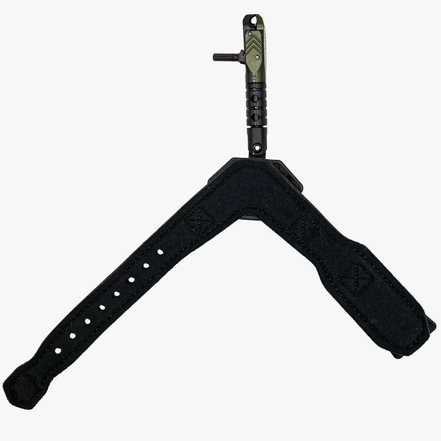 Black archery release aid with adjustable wrist strap on white background
