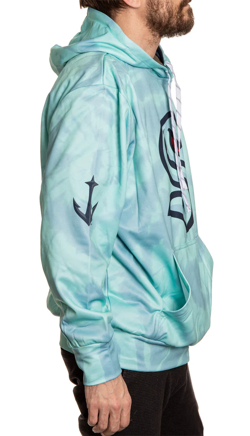 Man wearing light blue Kraken sublimated hoodie with anchor sleeve graphic and logo