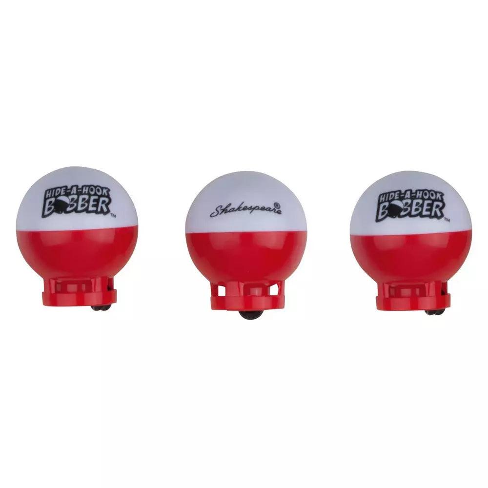 Three red and white Shakespeare Hide-A-Hook fishing bobbers side by side