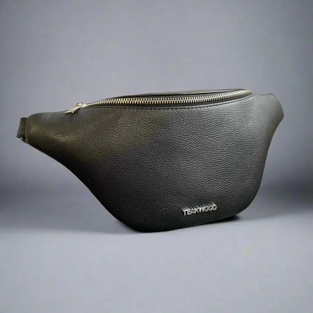 Black sheep leather waist bag with zipper closure on gray background
