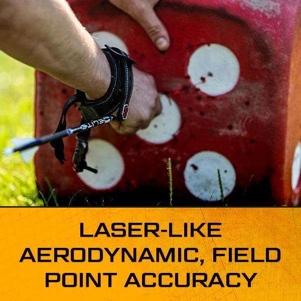 Archer retrieving arrow from red archery target block with white circles, field accuracy promo