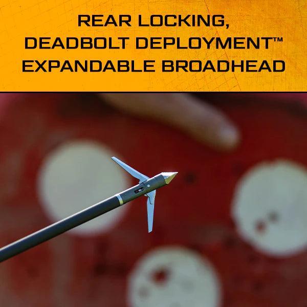 Expandable broadhead arrow with rear locking mechanism for archery, close-up against target.