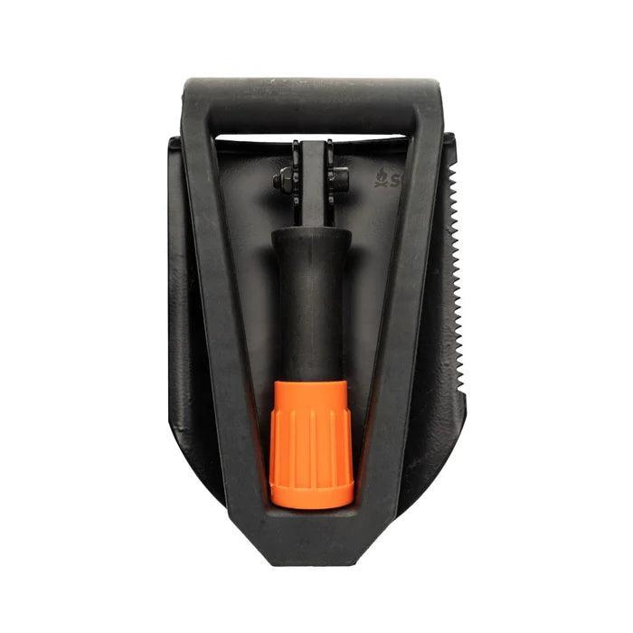 Folded black and orange packable field shovel with serrated edge, isolated on white