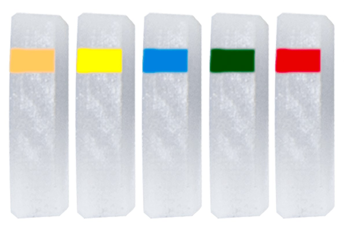 Five Specialty Archery PXL Hunter peep clarifier lenses in translucent holders, each with a different colored stripe: orange, yellow, blue, green, and red.
