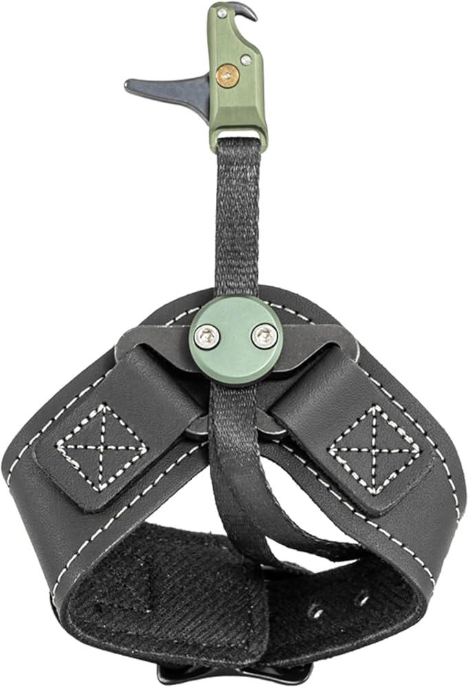 Black adjustable archery release aid wrist strap with trigger and green release head