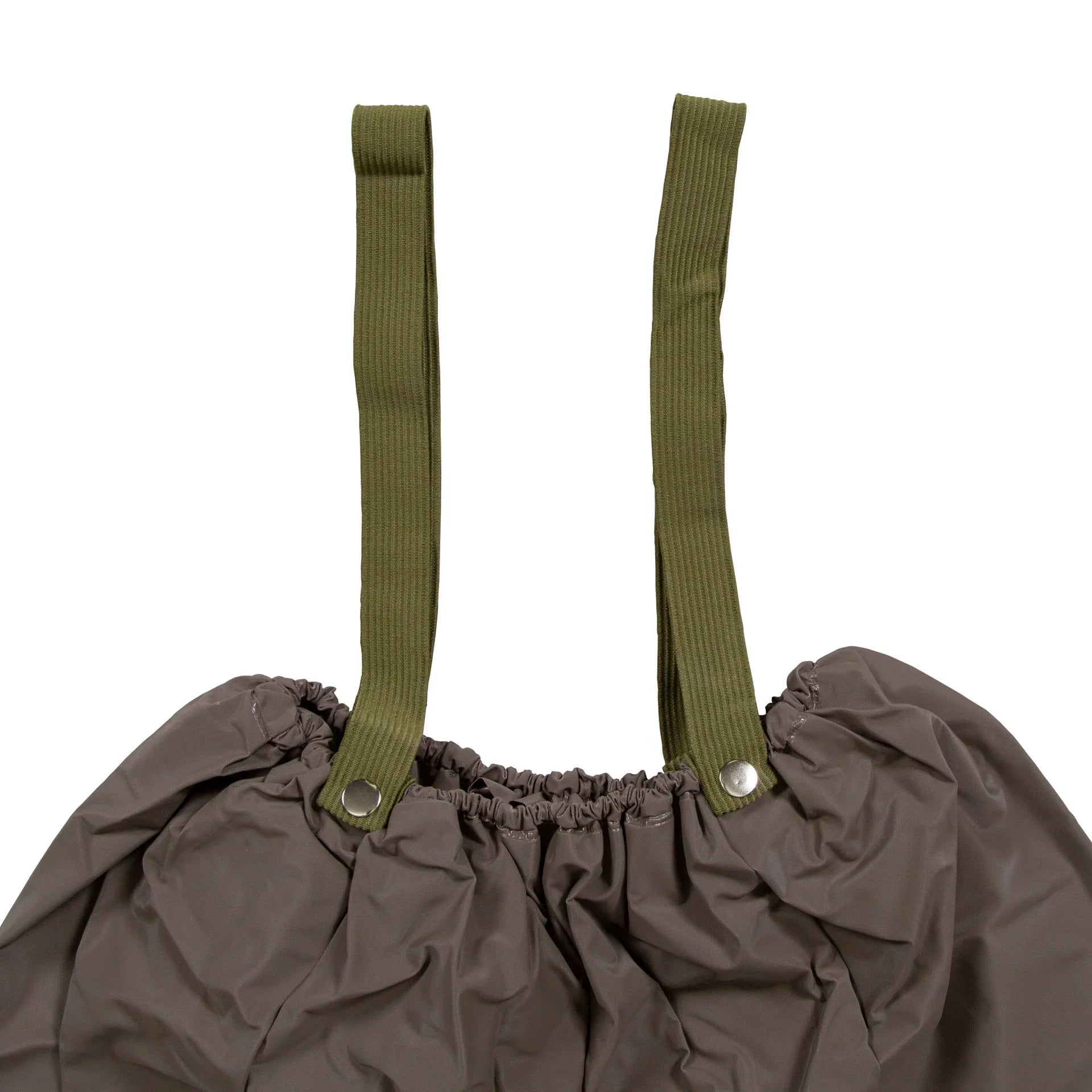Close-up of khaki rain pants with green suspenders and elastic waistband