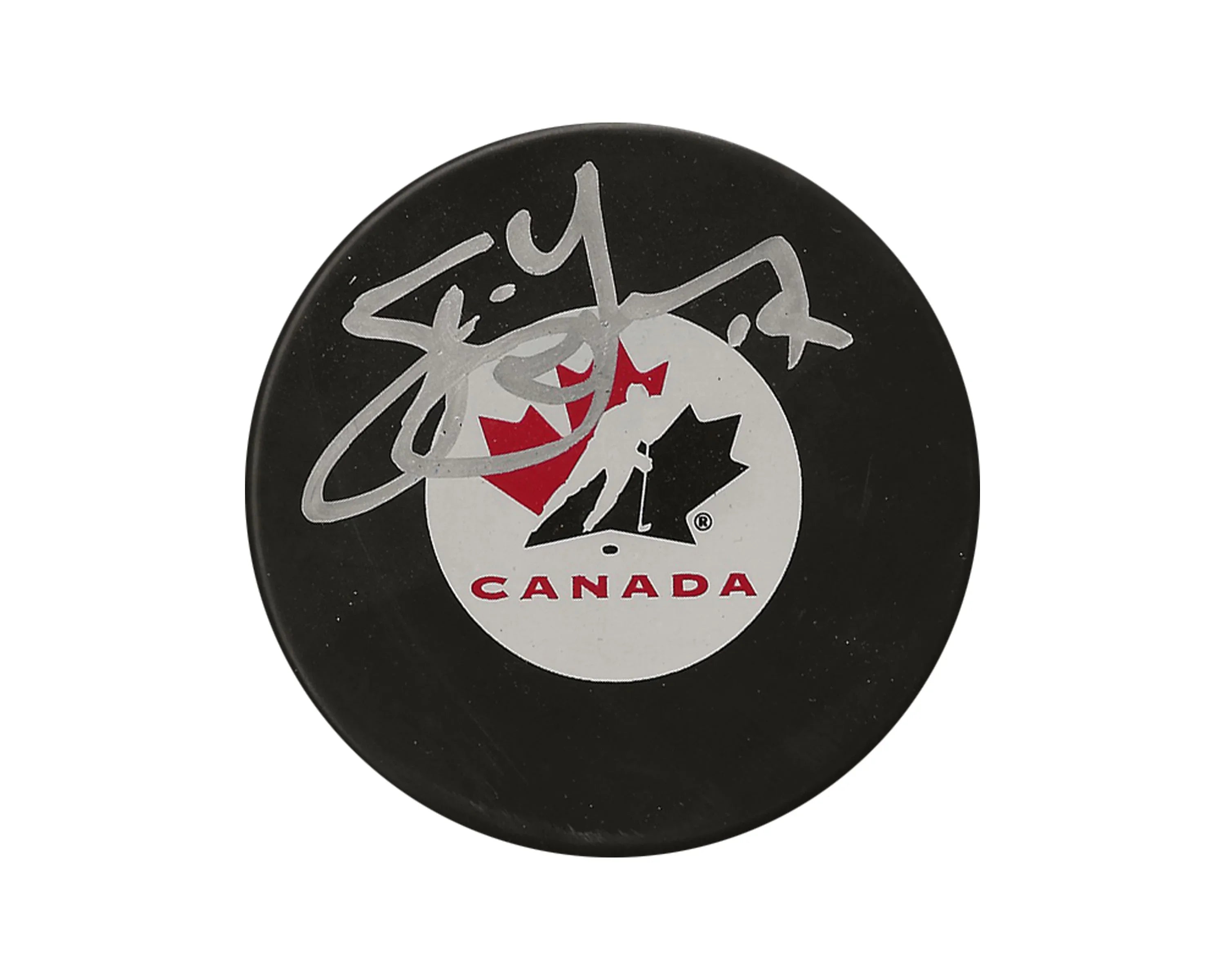 Signed Team Canada hockey puck with logo and black maple leaf design