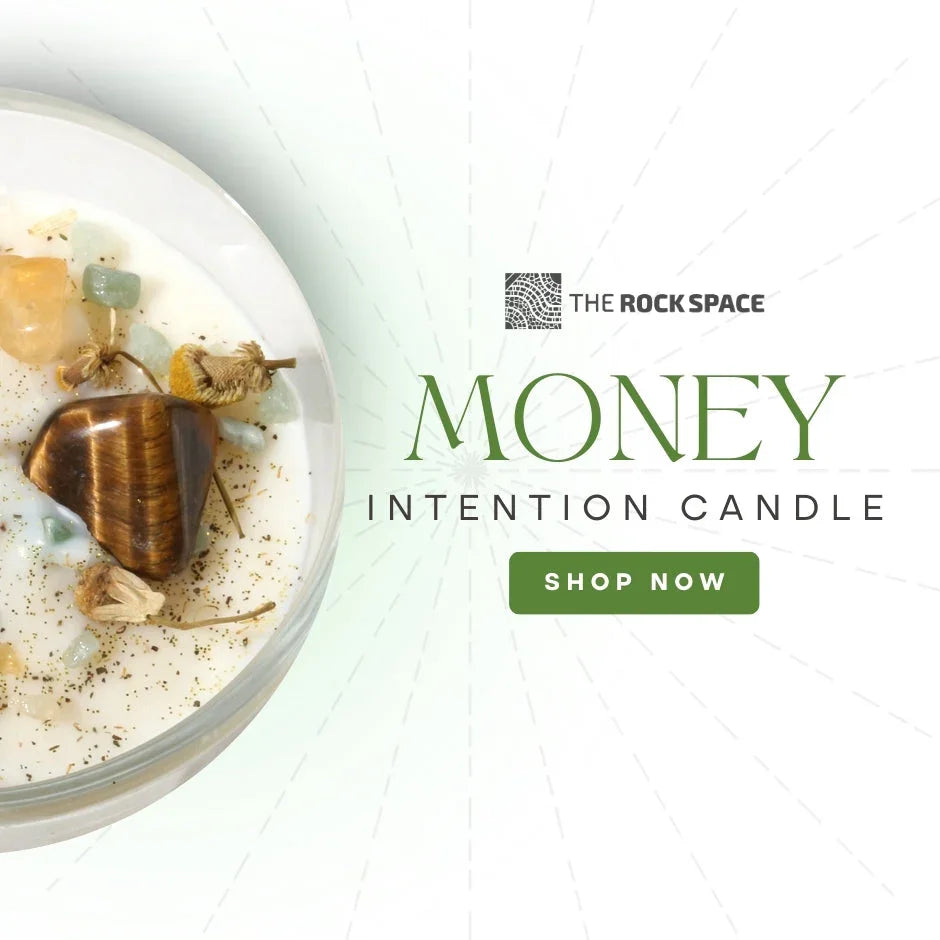 Money intention candle with crystals, herbs, and 'Shop Now' button, The Rock Space branding