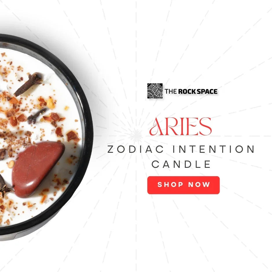 Aries zodiac intention candle with gemstones and herbs, The Rock Space, shop now button