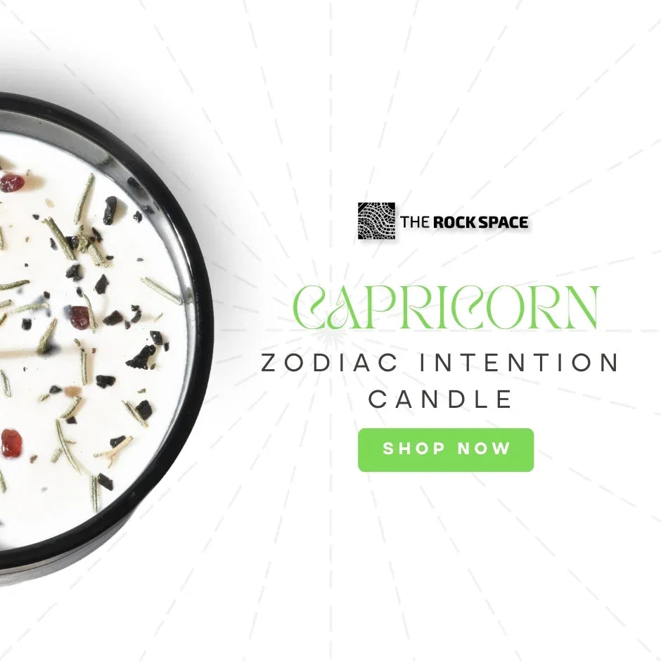 Capricorn zodiac intention candle with herbs, The Rock Space, shop now button