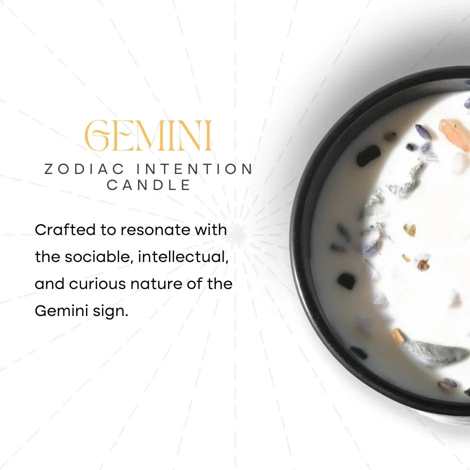 Gemini zodiac intention candle with crystals and herbs in a black container on white background.