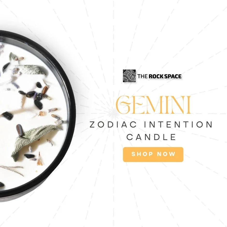 Gemini zodiac intention candle with herbs and crystals, The Rock Space branding, shop now button