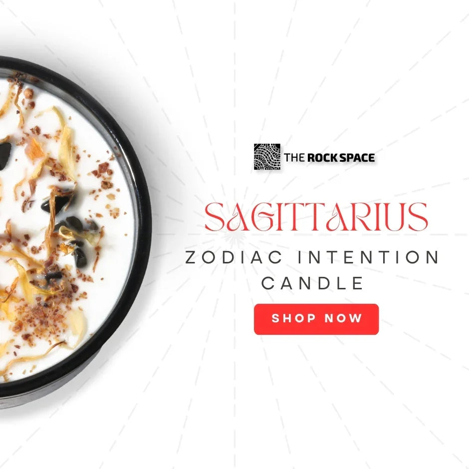 Sagittarius zodiac intention candle with herbs, The Rock Space, shop now button