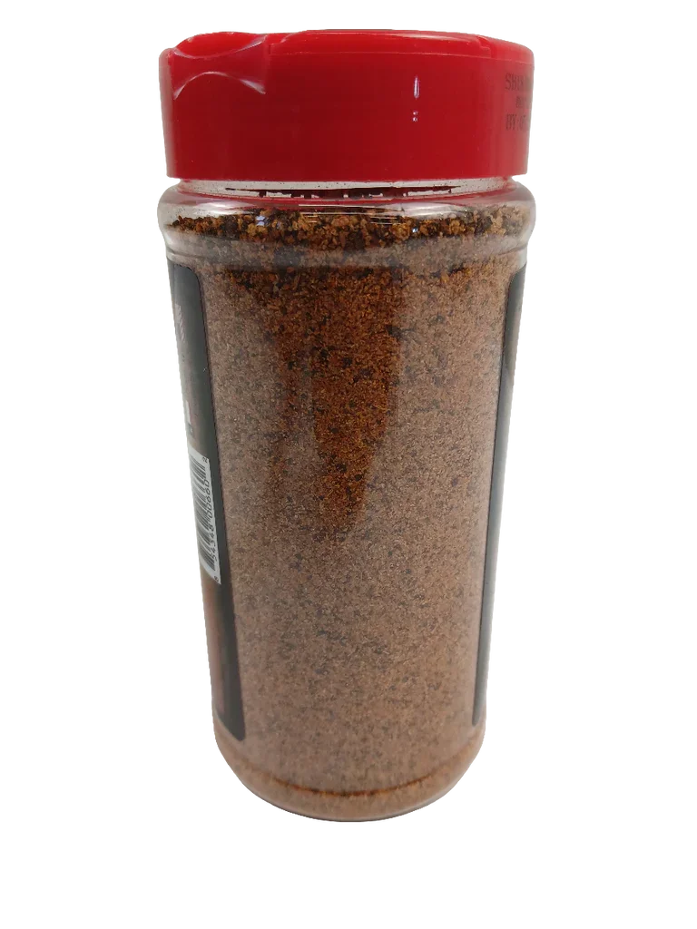 Plastic spice container with red lid filled with brown seasoning powder