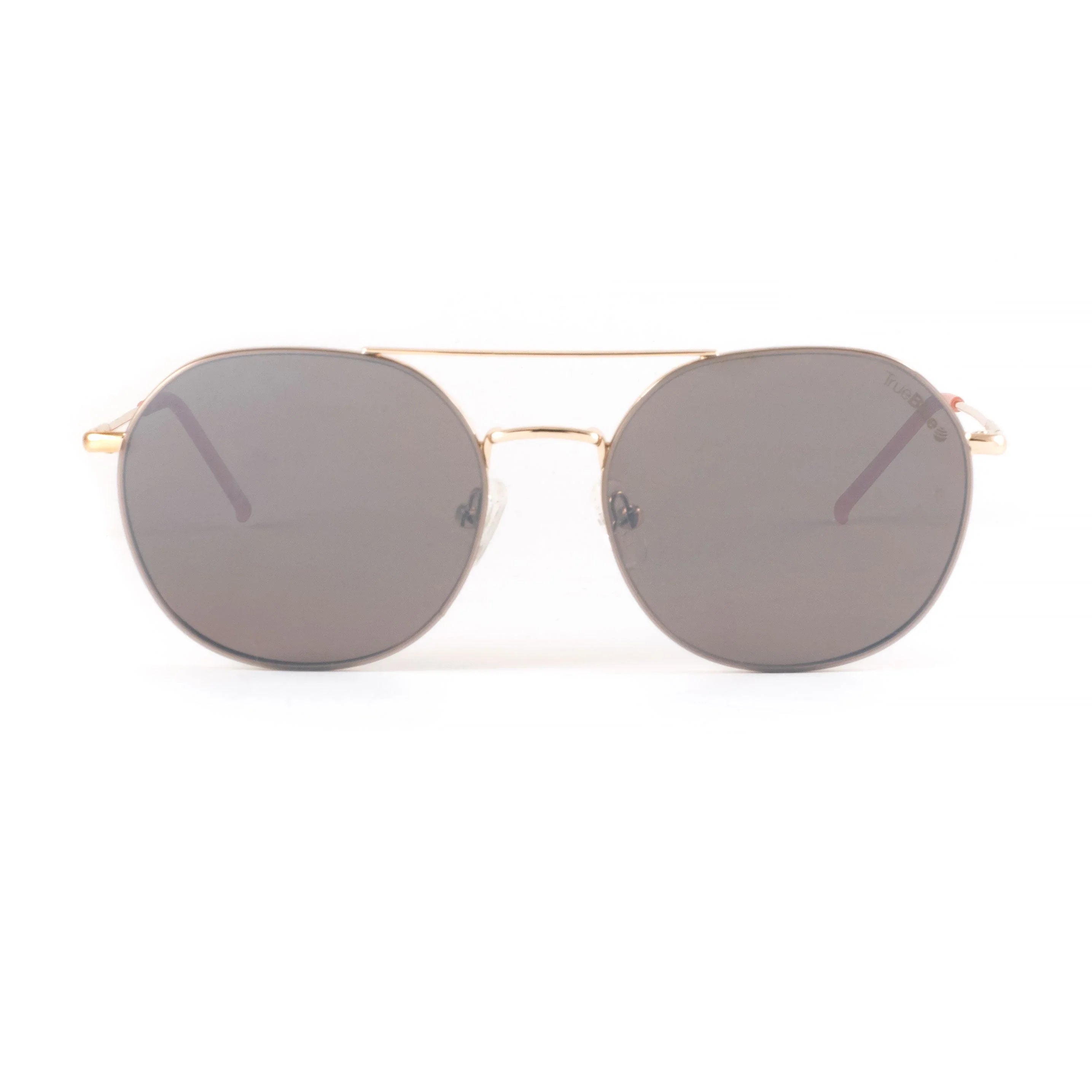 Round gold frame sunglasses with dark lenses on white background
