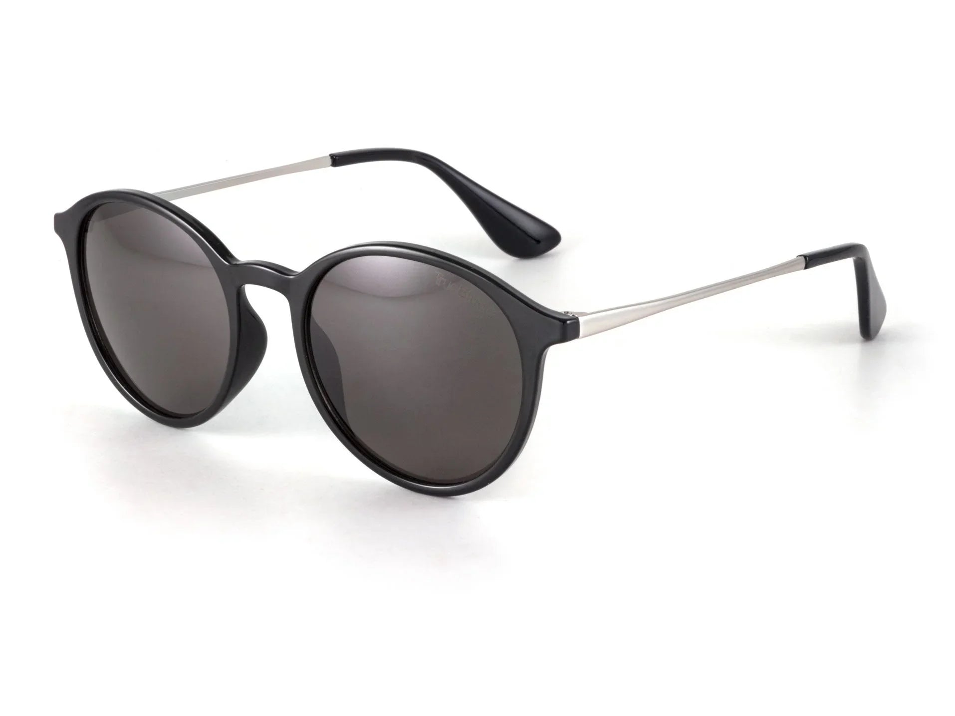 Round black sunglasses with dark lenses and silver arms on white background