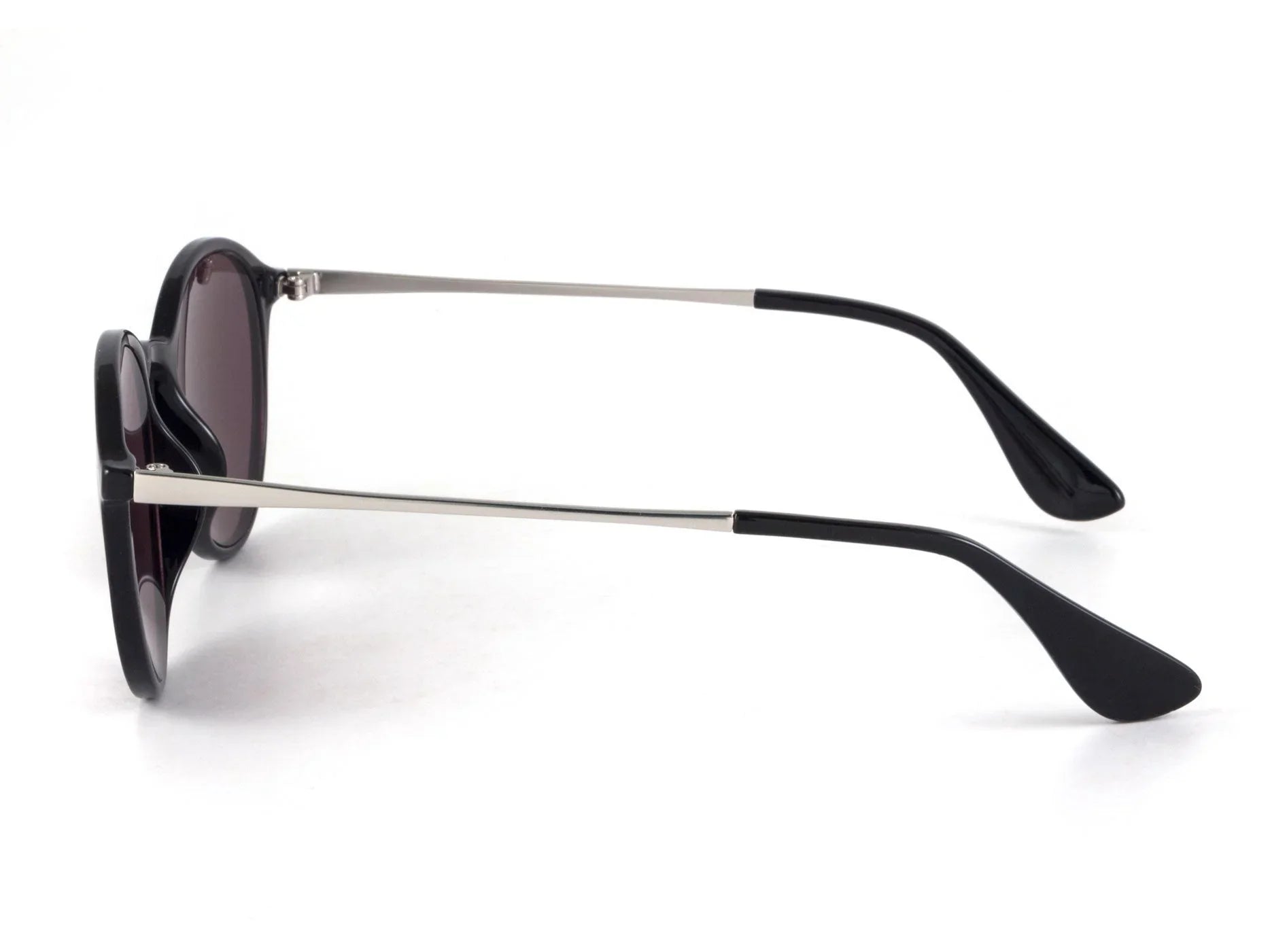 Side view of black round sunglasses with thin metal arms on white background