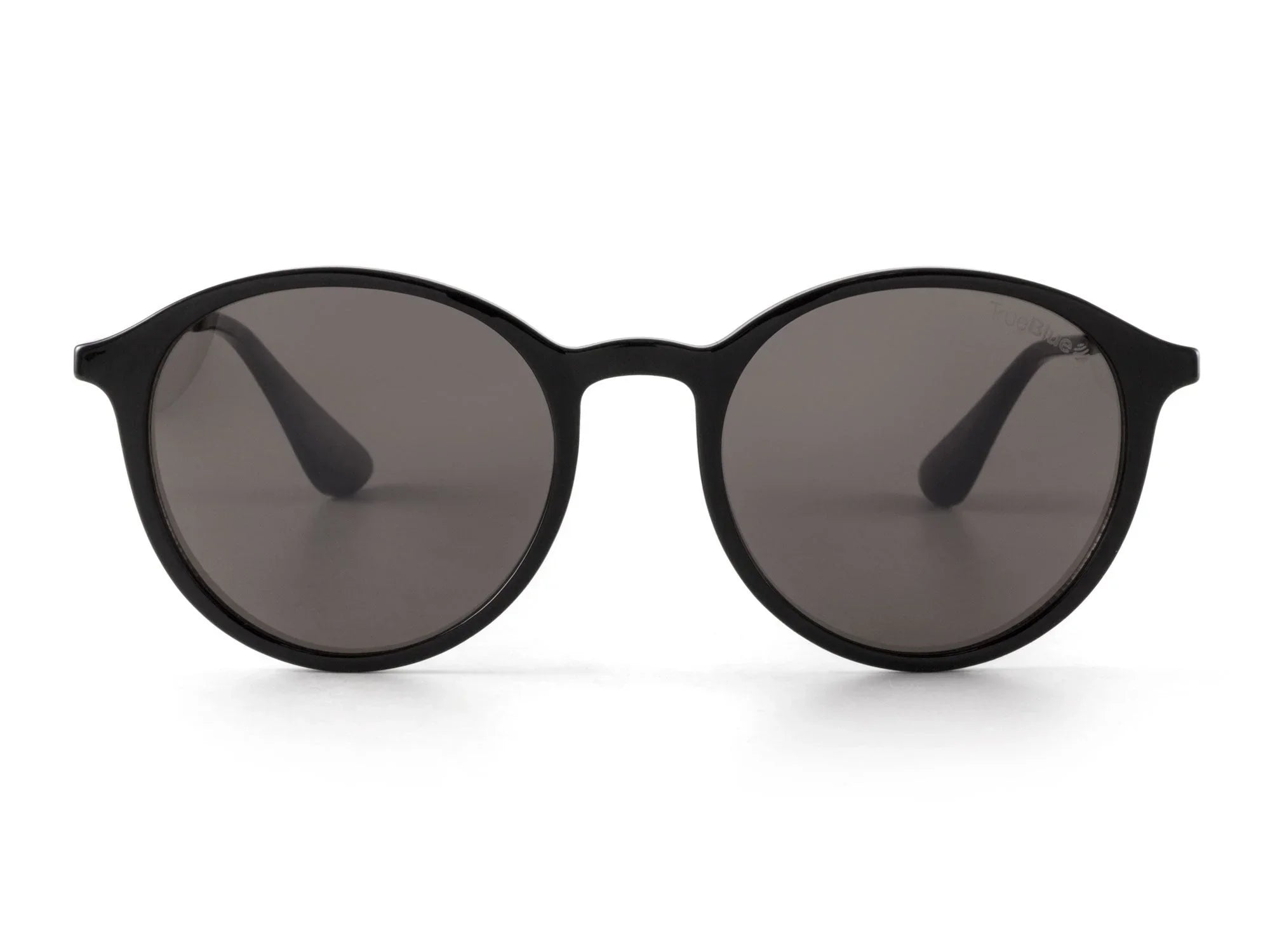 Black round sunglasses with dark lenses on a white background