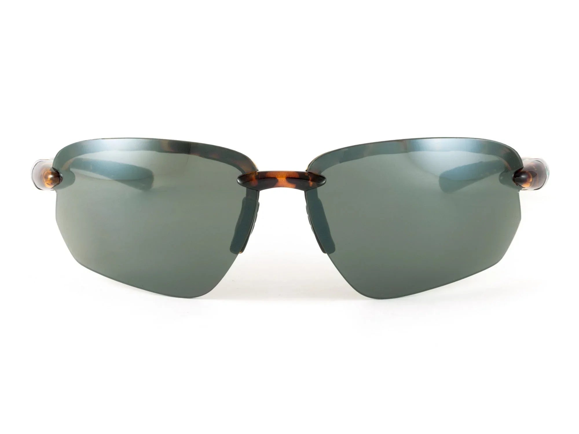 Rimless sunglasses with green tinted lenses and tortoise bridge on white background
