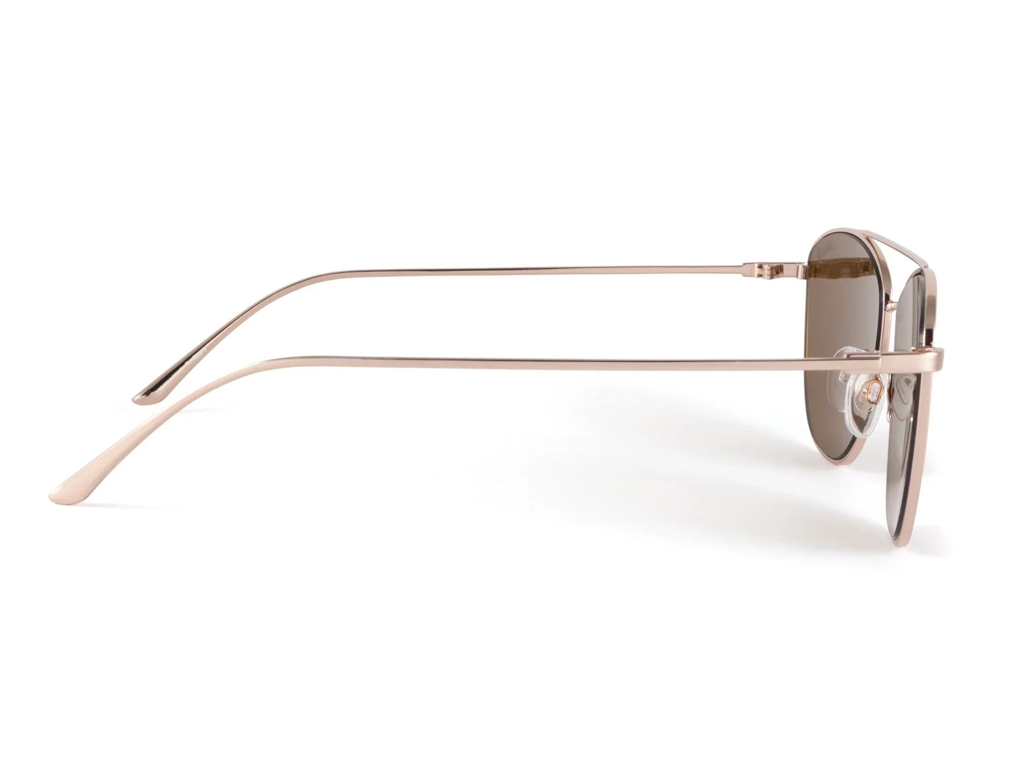 Side view of gold metal frame sunglasses with grey lenses on white background