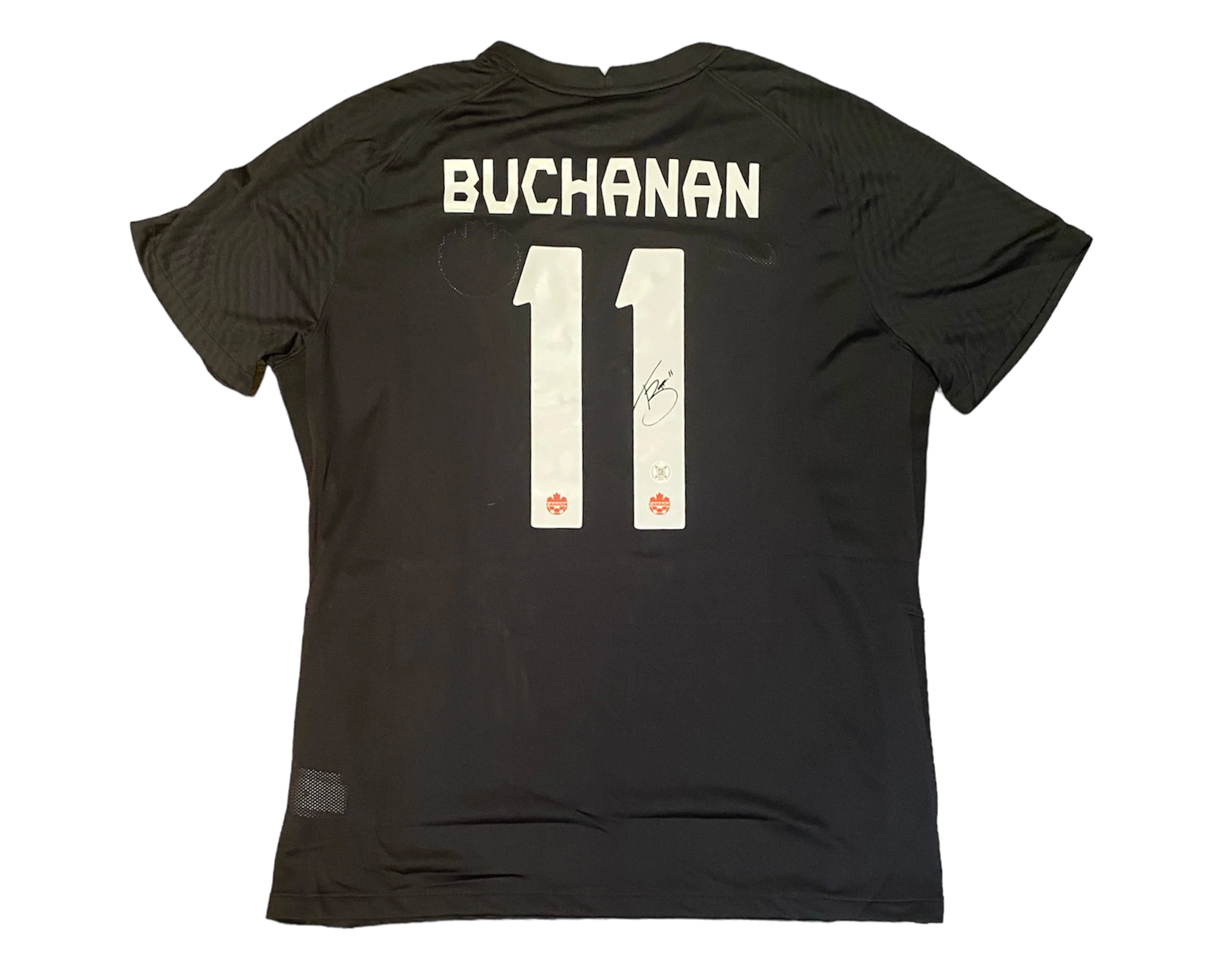 Black soccer jersey with BUCHANAN and number 11, white lettering, player autograph