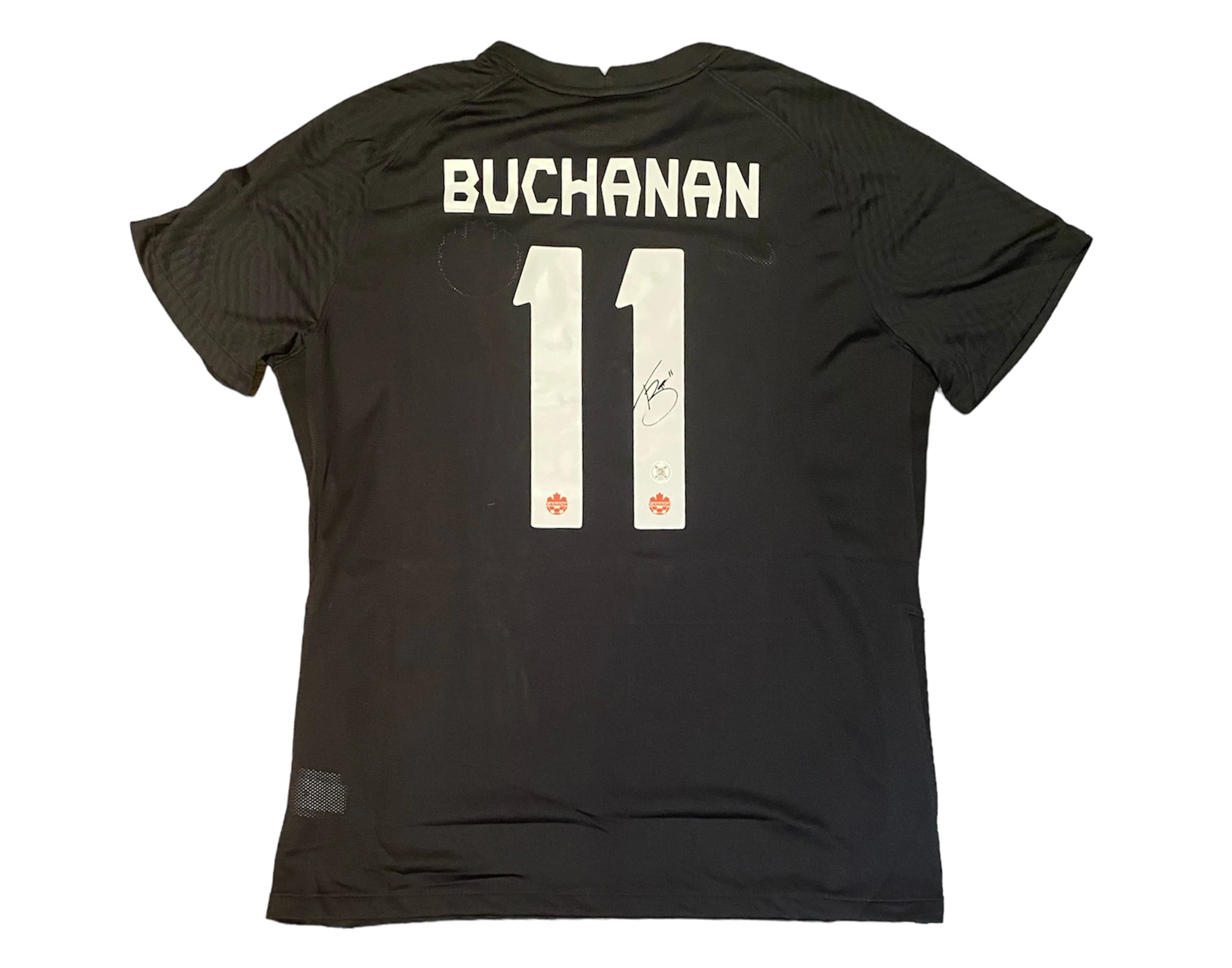 Black soccer jersey with BUCHANAN and number 11, white lettering, player autograph