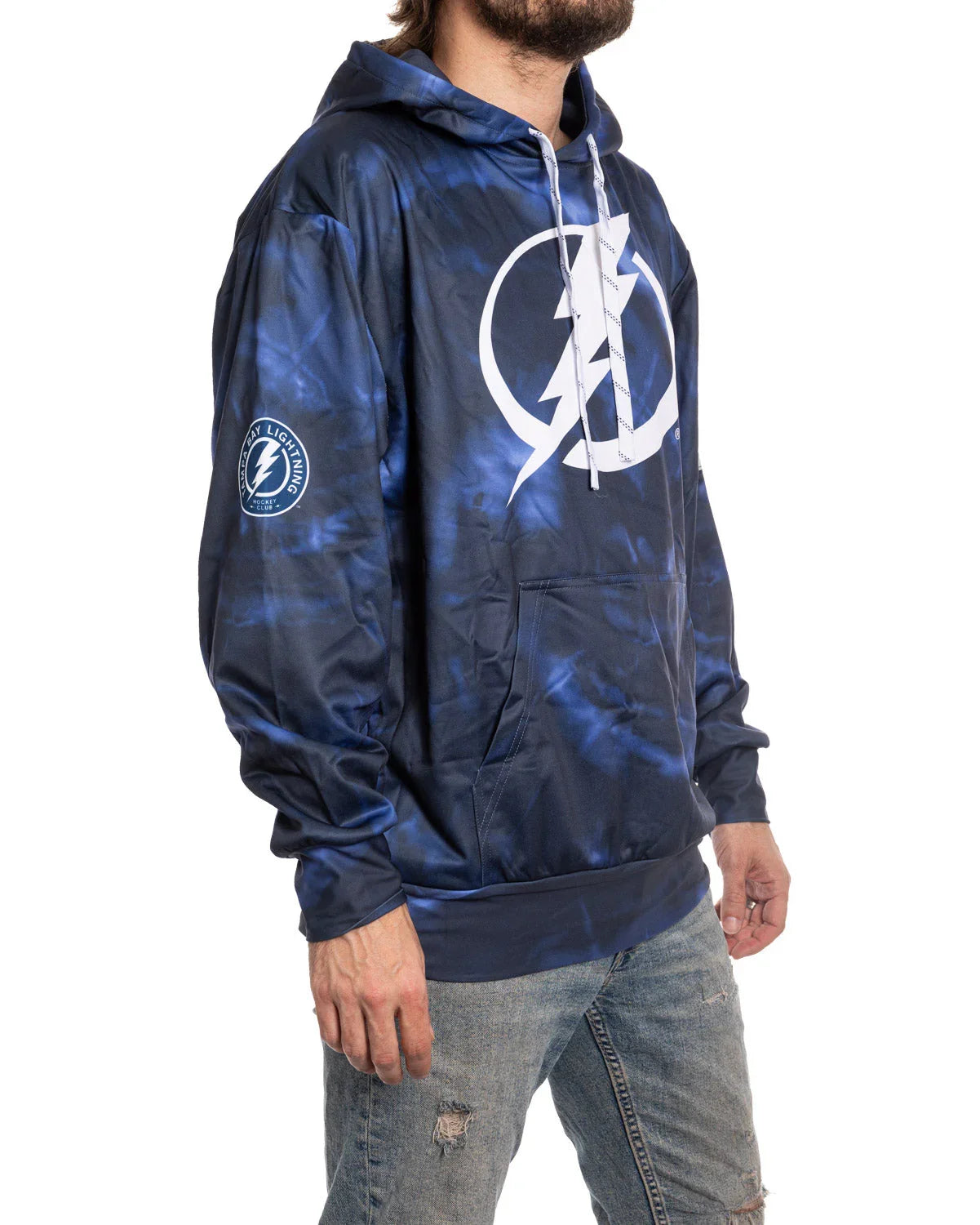 Man wearing blue Tampa Bay Lightning sublimation hoodie and ripped jeans