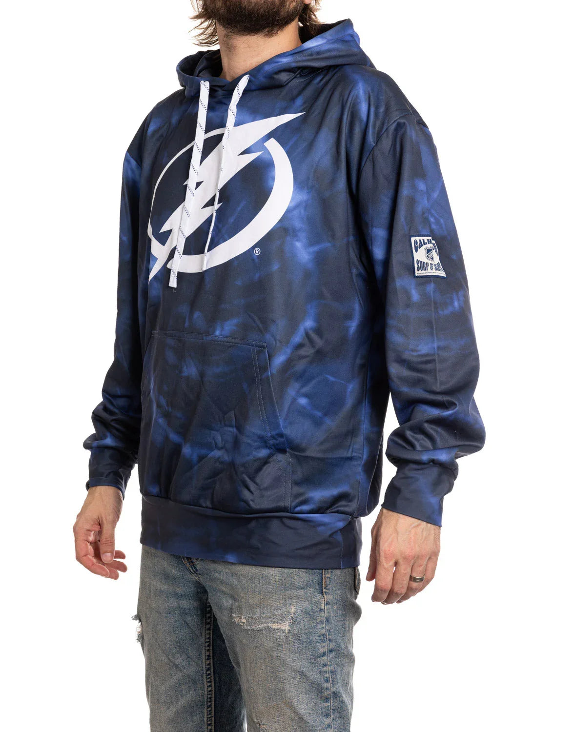 Man wearing blue Tampa Bay Lightning sublimation hoodie with large logo, ripped jeans